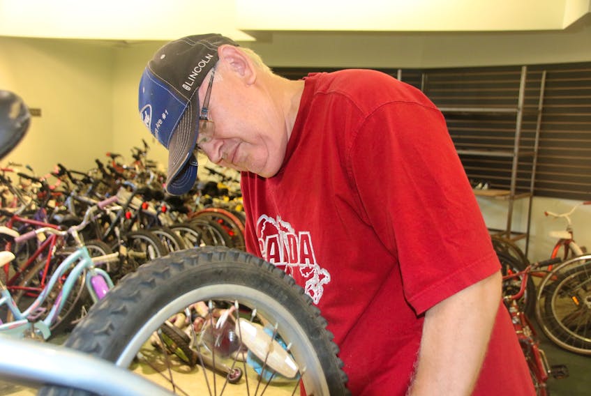 Tim Sexsmith has been fixing bicycles donated to the Colchester United Way’s Bikes for Kids program recently. This is his first year helping out with the program, but he says he’ll be back.