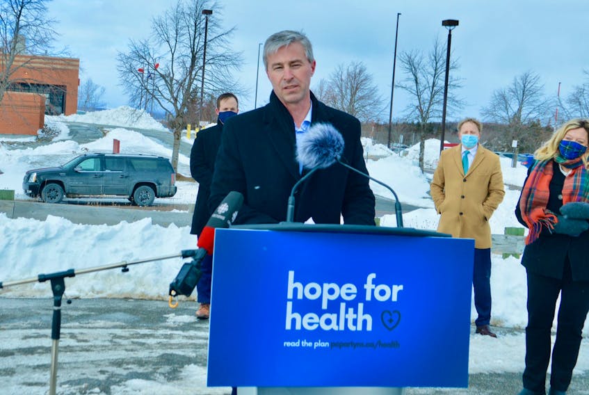 Opposition Leader Tim Houston explains the Progressive Conservative party’s proposed health-care plan during a news conference near the Cape Breton Regional Hospital on Wednesday. -- ELIZABETH PATTERSON/CAPE BRETON POST