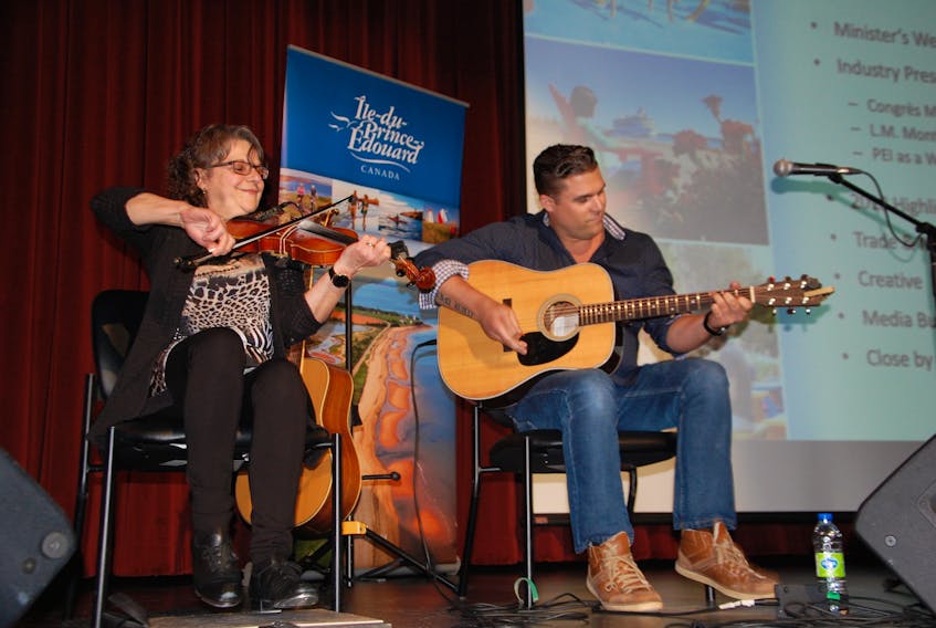 Louise Arsenault and Jonathan Arsenault provide some upbeat entertainment Wednesday during the launch of the province's 2019 tourism marketing campaign.