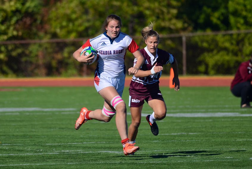 Harley Tucker in action with the Acadia Axewomen.
