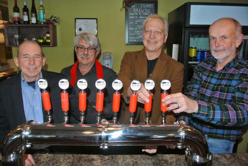 (From left) Wendell Gallagher, Norman Rafuse, David Bettie and Tom MacLaren are the four partners behind Two Islands Brewery and Rising Tide Bakery in Parrsboro.