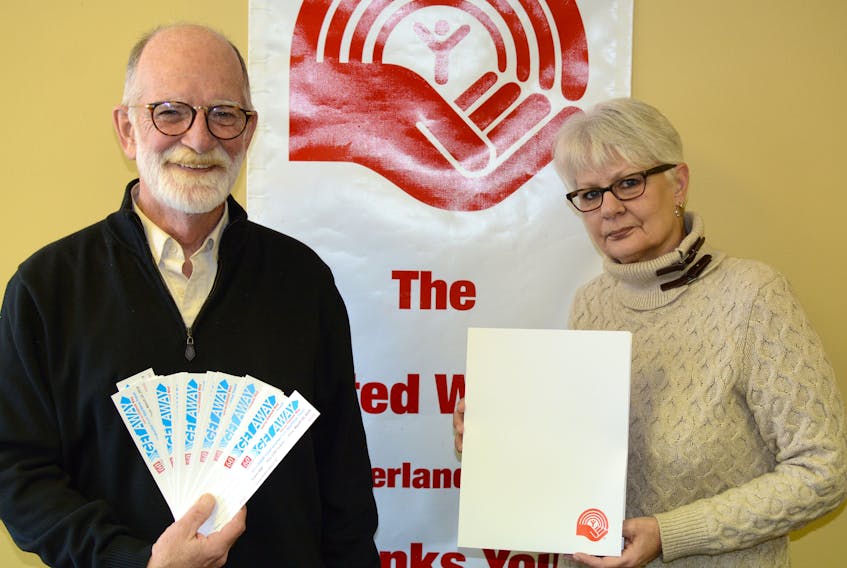 With only two weeks left in the 2018 campaign, Dave March, seen here holding $4,000 Get Away tickets, and Cathy Skinner, holding one of the kits that are sent to local businesses, encourage people to make their donations to the United Way of Cumberland County. March is the president of the United Way of Cumberland County, and Skinner is the executive director.