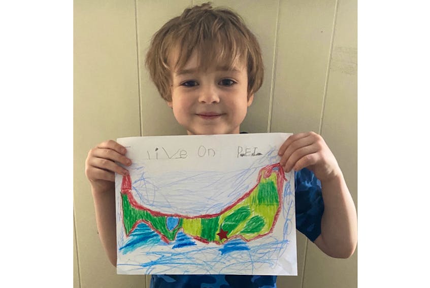 Five-year-old Denny Gallant poses with his Picture of the Day submission. Great job, Denny!