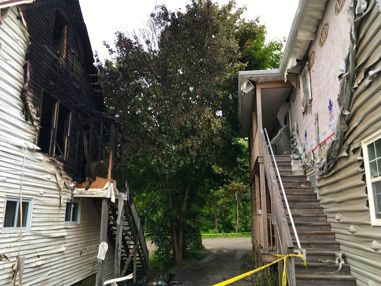 Firefighters were able to prevent a blaze that broke out in an apartment on River Street in Kentville June 23 from spreading to other units and nearby buildings, including one that was close enough to sustain heat damage in the form of melted siding.