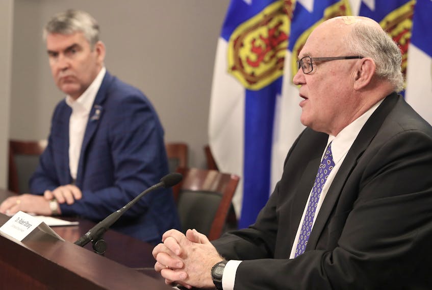 Nova Scotia Premier Stephen McNeil and Dr. Robert Strang, Nova Scotia's chief medical officer of health, speak at a news conference Friday. - Communications Nova Scotia