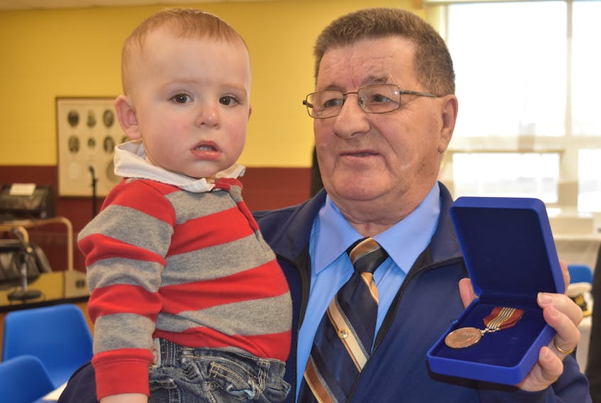 Vincent Joyce was happy to have his grandson Brett on hand as he was presented the Sovereign’s Medal for Volunteers in recognition of his contributions starting and managing the Pictou County Military Museum.