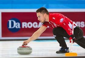 Brett Gallant throws a rock Friday during the playoffs at the world mixed doubles curling championship in Norway. Tom Rowland/World Curling Federation