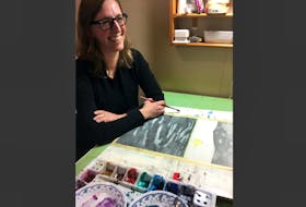 Alli Johnston is shown at work in her Corner Brook studio. Her exhibit … and still the wildflowers grew is on display at the Rotary Arts Centre in Corner Brook until Feb. 15. - DIRK MUIR PHOTO