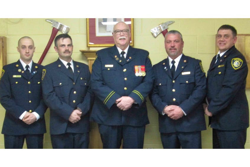 The Stellarton Fire Department recently presented several members with Service Awards. From left, firefighters Patrick Ward and Steve Cassidy (five-year service pins); Brian “Tiny” Campbell (45 years) and James “Boobie” MacKenzie and Mike Dean (10-year service pins).