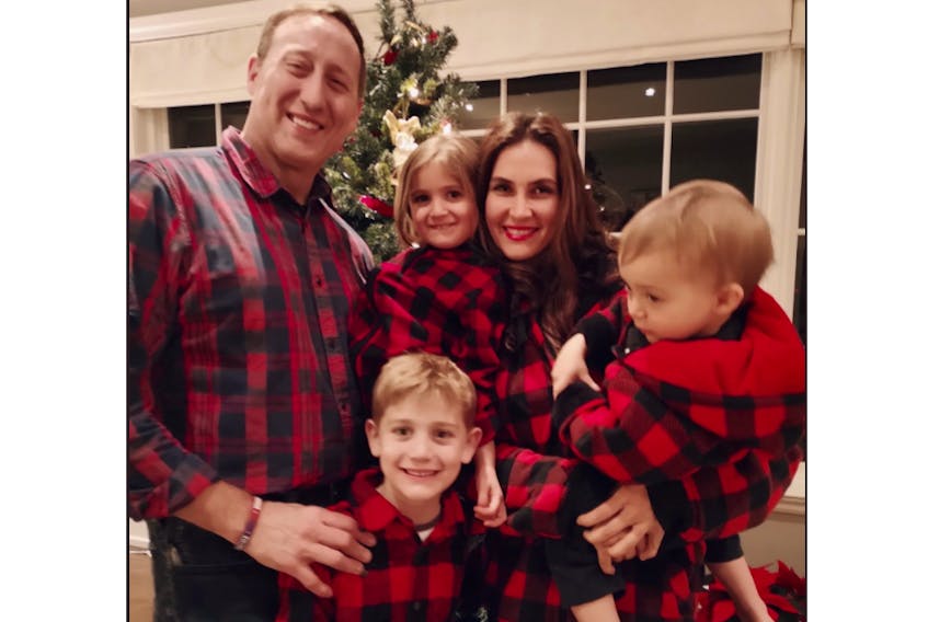 Peter MacKay shared this photo of himself and his wife Nazanin with their children on his Twitter account. For the last four years he's been balancing a law career with family life. Now he's poised to jump back into the political arena. TWITTER