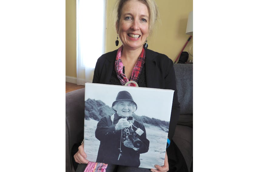 Heather Tulloch displays a photo of her grandmother, Scottish documentary filmmaker Jenny Gilbertson, whose films are being showcased in New Glasgow.