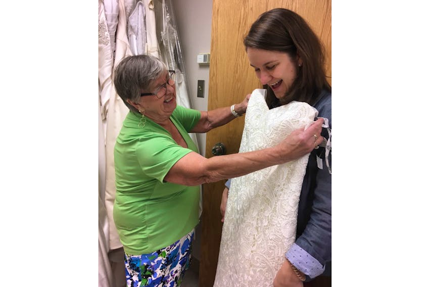 Dorothy Lodge has made a significant donation of dresses to Summer Street Industries. Here she is pictured with Liz LaPier, Summer Street's manager of social enterprises.