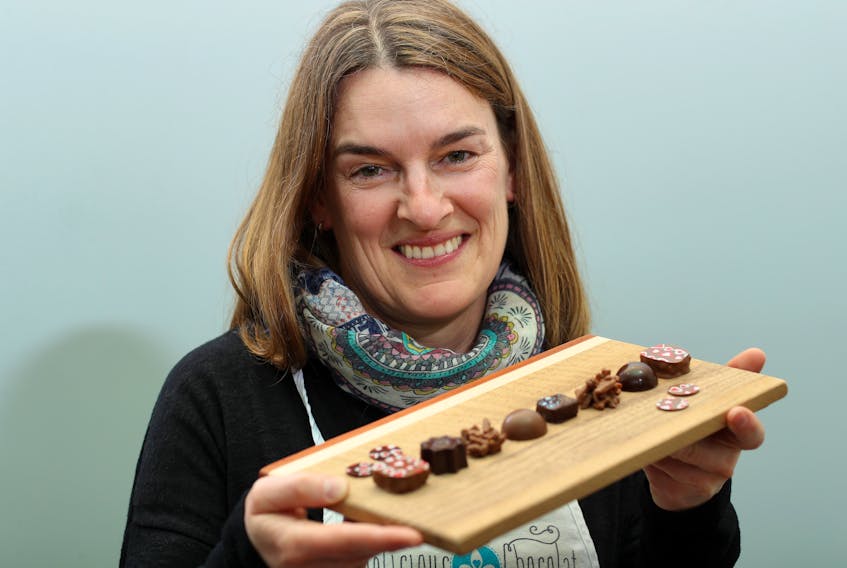 Mélanie Leclerc with a sampling of her chocolates.