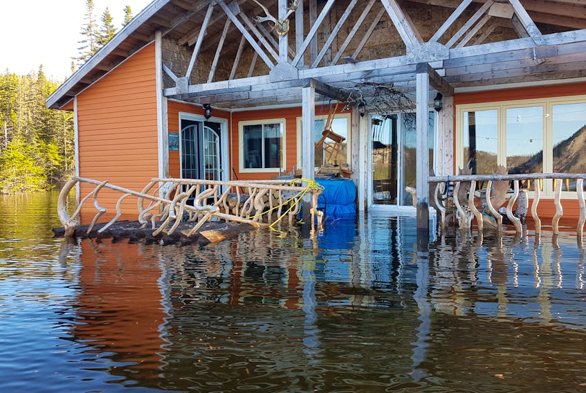 This cabin belonging to Melvin Hoyles is partly submerged due to high water levels of Bottomless Pond in Goose Arm. - Photo by Mark Hoyles