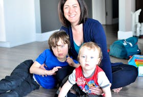 Deirdre Andrews is seen at home with her two sons, Rylan, at left, and Isaac. The Corner Brook woman has postpartum depression and is starting a support group for moms who also suffer from the mental illness.