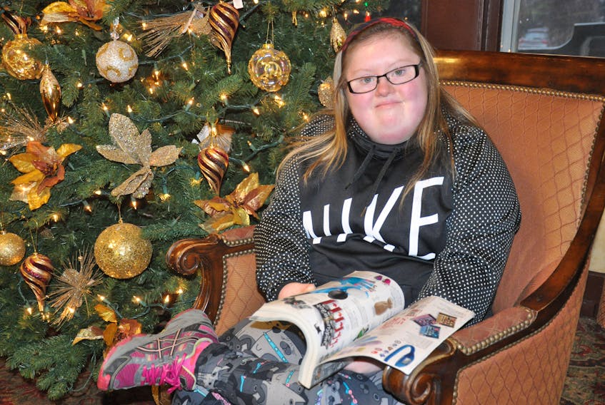 Cheyenne Moore loves the Sears’ Wish Book and now that it is no longer being produced, her family is looking for old copies that she can enjoy. Cheyenne is seen looking through the 2012 - 60th anniversary Wish Book at the Glynmill Inn in Corner Brook.