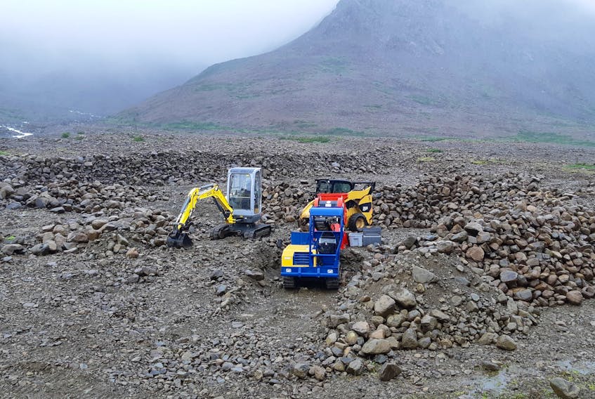 These pieces of machinery are being used to crush rock at the base of The Tablelands in Gros Morne National Park for use in work on trails within the park