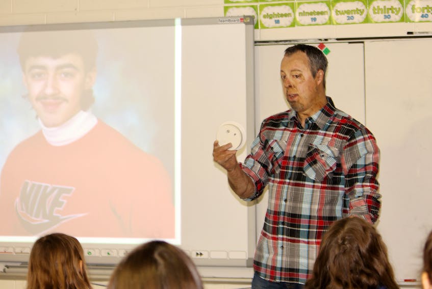 Motivational speaker Michael Gaultois is seen addressing students at Our Lady of the Cape School on Thursday morning.