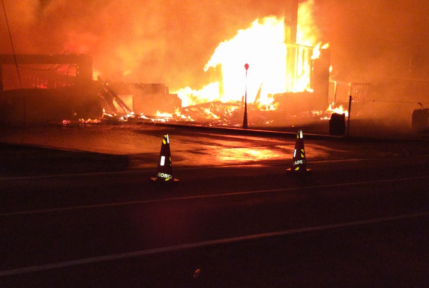 A home in Cape St. George is seen burning on Monday night.