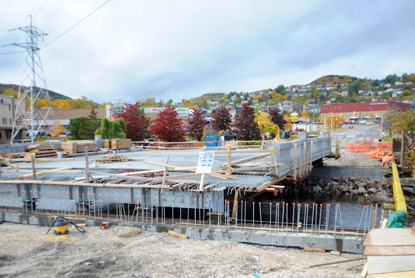 The long-awaited move of the new Main Street bridge in downtown Corner Brook was carried out Friday. The slow, delicate process, which involved jacks sliding the new four-lane structure along rails to its permanent position over the Corner Brook Stream, was expected to take between eight to 10 hours to complete. It will be several more weeks before the remaining work is completed and the bridge is opened to traffic.