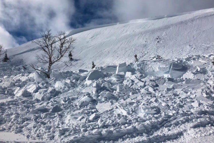 This is the aftermath of an avalanche near Hawkes Bay that caught one snowmobiler in a group riding through the area at the time.