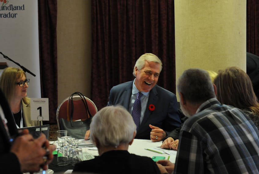 Premier Dwight Ball chats with some delegates at the Municipalities Newfoundland and Labrador annual conference prior to hosting the Premier’s Forum on local government in Corner Brook Wednesday.