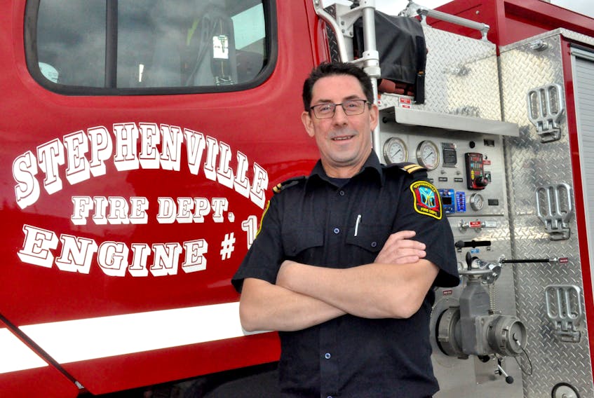 Captain Chris Butt of the Stephenville Fire Department poses for a photo outside the fire station on Carolina Avenue.
