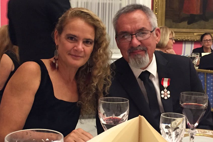 Sporting his Order of Canada insignia, Michael Massie of Kippens is seen with Governor General Julie Payette after she conducted a ceremony invested him and a number of others into the order.