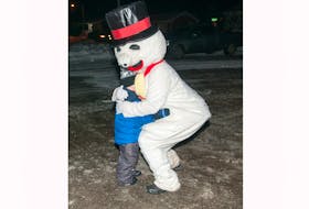 There's no mistaking Happy's impact when he's out and about during Pasadena Winter Carnival. Tim Spicer, the man who plays Happy, finds escape within the mascot's costume. - Carol Griffin photo