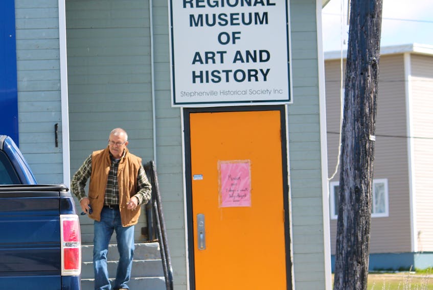 Maurice Hynes leaves from the back entrance of the Royal Canadian Legion in Stephenville, located near the entrance to the current Regional Museum of Art and History in the basement of the building.