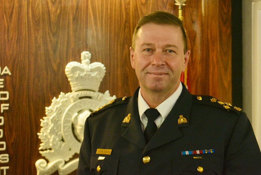 Curling native Ches Parsons is the new head of the RCMP in Newfoundland and Labrador. Standing in front of the wall in the same fashion he did when he was 12 years old.