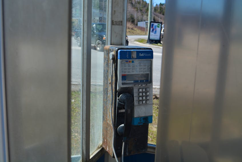 This payphone sits idle in its place near the River’s End Motel on Riverside Drive in Corner Brook in late May.