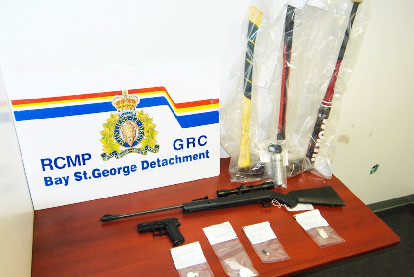 Above are items seized by investigators into a robbery with a firearm including replica firearms, weapons and a quantity of cocaine, hash, cannabis resin and methylphenidate (ritalin).