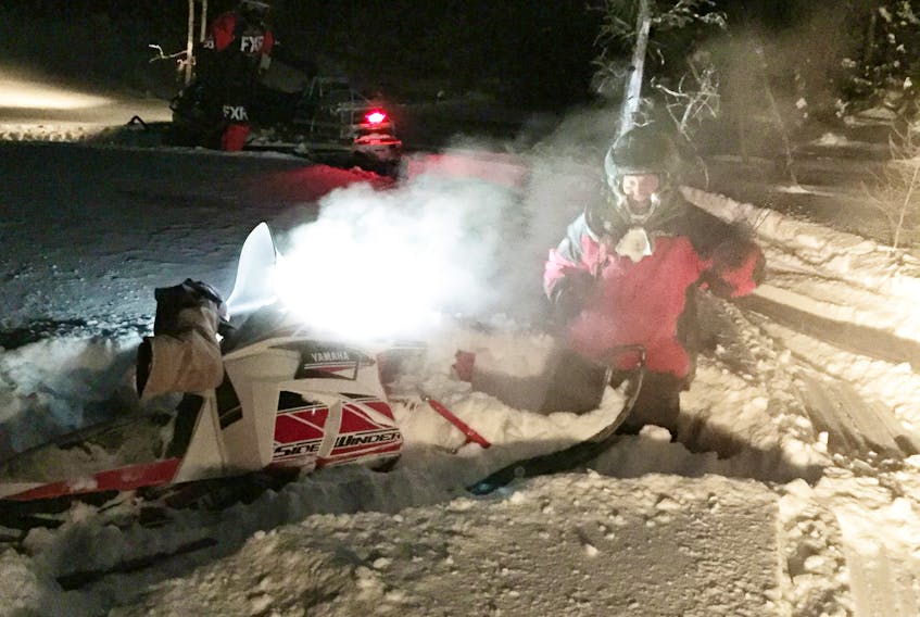 Brian Seaward of Pasadena digs his sled into deep snow during some practice riding in Labrador last month.