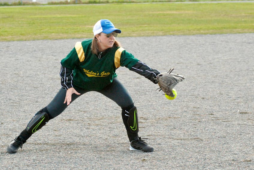 Wendy Parsons fields some grounders during a Corner Brook Molson Ladies Softball League practice with Whelan’s Gate last week at Ambrose O’Reilly Memorial Field.