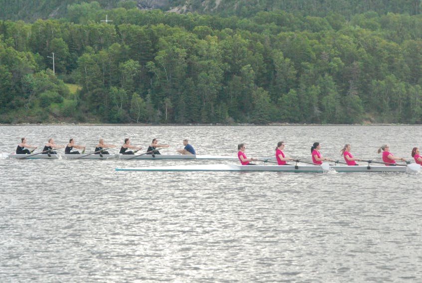 The Barry Group take the lead in the first women’s race against Key Assets of St. John’s at the 2018 Corner Brook Regatta Saturday morning at Brake’s Cove. The Humber Valley Rowing Club women’s team won the race.