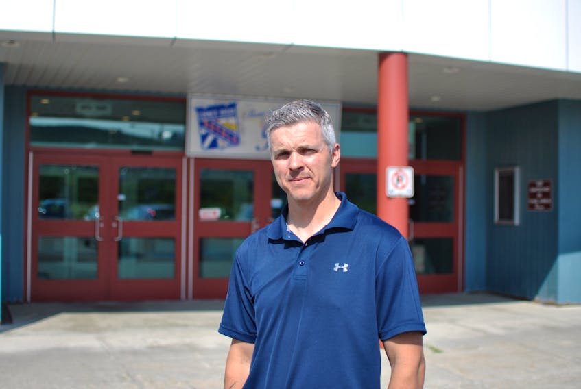 New Western Bantam AAA Kings coach Brad Penney poses for a photo outside the Corner Brook Civic Centre on Wednesday.
