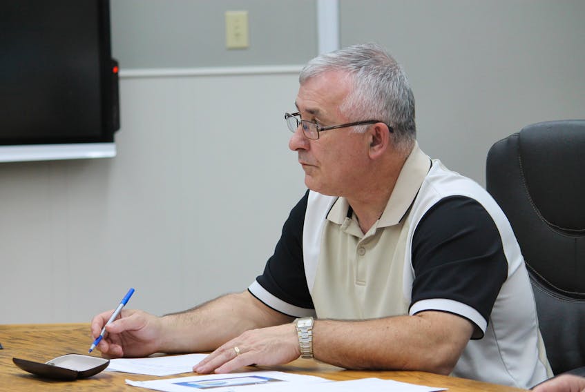 Coun. Mark Felix, chair of the Stephenville town council’s finance committee, is seen read out finance item at Thursday’s regular general meeting.