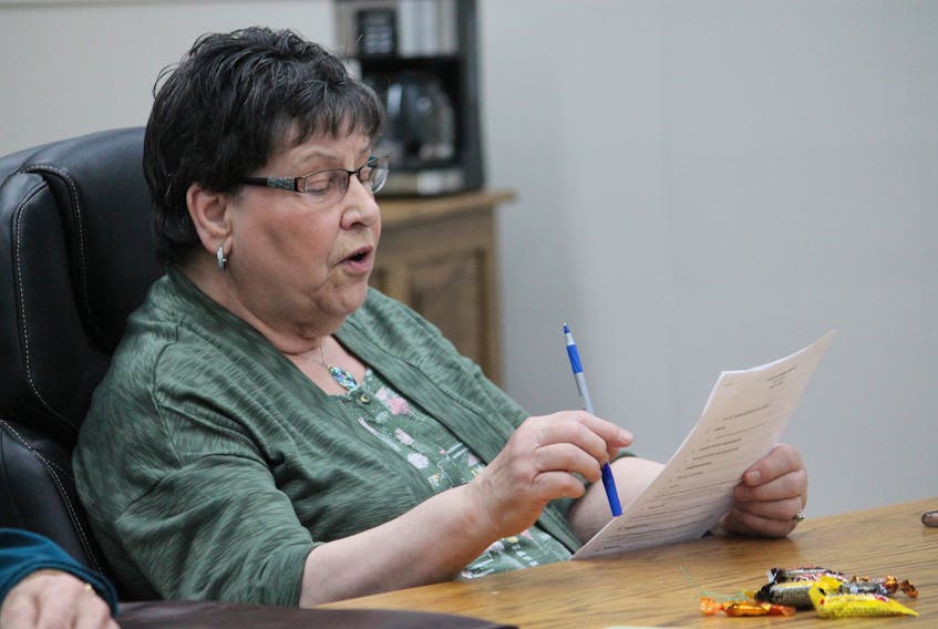 Coun. Laura Aylward of the Stephenville town council’s planning and traffic committee is seen reading out an item at Thursday’s meeting.