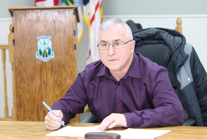 Mark Felix, chairman of the Town of Stephenville’s finance committee, is seen reading out items during last Thursday’s regular general meeting.