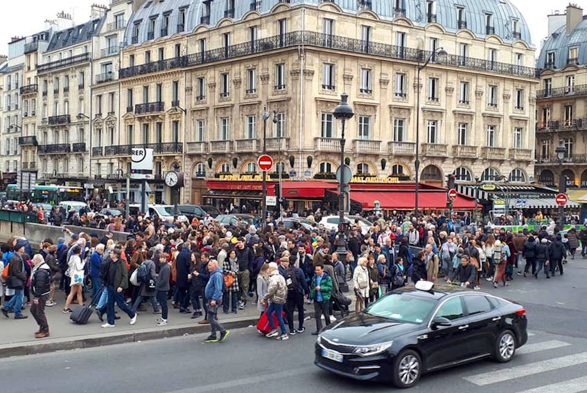 This photo, taken in Paris on Tuesday by Deborah Coughlin of Stephenville, just a few blocks from the Notre-Dame Cathedral fire, shows the congestion of people trying to get around in the streets.