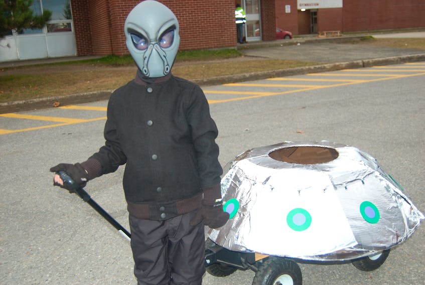 Seven-year-old James Crocker of Kippens went trick-or-treating as an alien with his spaceship in tow at the Bay St. George Crime Stoppers first ever Trunk ‘n’ Treat held in the parking lot of Stephenville High School that had hundreds of children drop by.