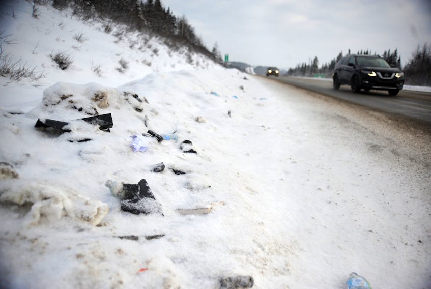 Debris from a fatal collision Tuesday evening was still strewn along the side of the Trans-Canada-Highway about one kilometre west of Pinchgut Lake in western Newfoundland Wednesday morning. A 72-year-old woman from Stephenville lost her life and a man is in hospital with critical injuries after their SUV struck a transport truck.