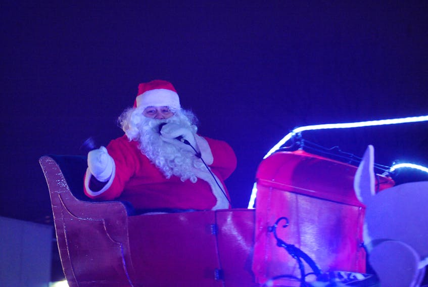 Santa Claus greets the hundreds of people who came out to see him at the annual Corner Brook Santa Claus Parade Saturday evening.