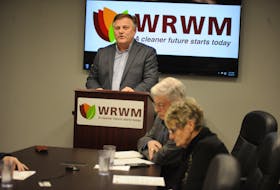 Josh Carey, chair of the Western Regional Service Board, speaks at a press conference in Corner Brook Tuesday, outlining the board's plans for the region's recyclable materials now that it won't be shipped to central Newfoundland for processing. Listening in are board members Bernd Staeben from Corner Brook and Cynthia Downey of Stephenville Crossing.