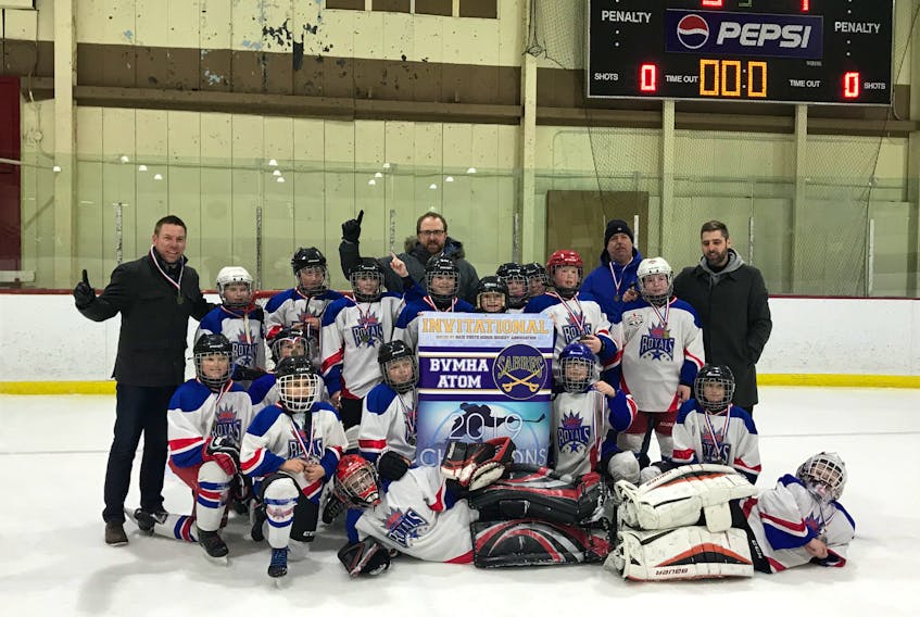 The Corner Brook Royals Atom C hockey team won the gold medal at the Baie Verte Minor Hockey Invitational. Members of winning team are, from left, Jayla Matthews, Cade Dredge, Cole Griffin, Keegan Lynch, RJ Trimm, Isiah Gillingham, Caden Monteith, Luke Grant, Aiden Sansome, Jesse Warren, Breanna Way, Andrew Skinner, Bryton Baines, Ethan Hicks, Liam O’Quinn, Mitchell Pike and Ryan Jackson. And coaches Colin Lynch, Jamie Pike, Lee O’Quinn and Chris Griffin.