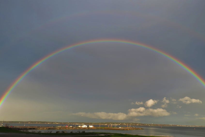 Judith Brennan was rewarded for looking up! She spotted this magnificent evening rainbow over Indian Beach, North Sydney, N.S.