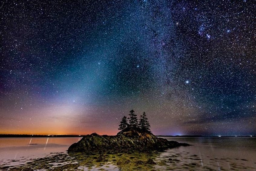 The Zodiacal Light in the pre-dawn sky is a sure sign of the changing seasons. This lovely optical phenomenon is not easy to see, especially in the city with all the light pollution. We're fortunate that Barry Burgess is so passionate about the night sky and that he's generous enough to share his amazing photo with us.  This one was taken last Saturday in the early morning sky over Lockeport, N.S.