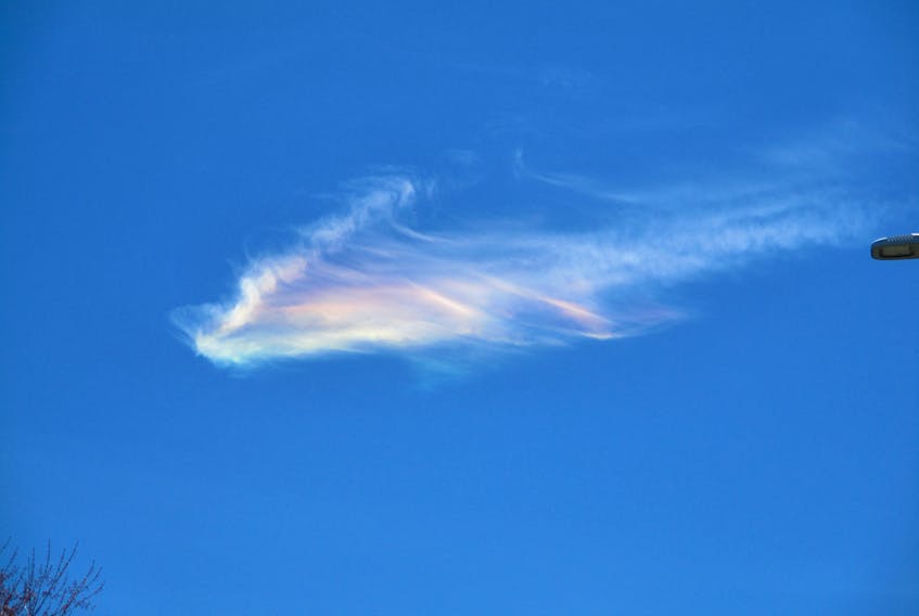 On Monday, many people across Nova Scotia’s Annapolis Valley spotted these lovely rainbow-coloured clouds. Jim Amos saw them too, just after noon in Wolfville, NS.  He submitted this photo and wondered what caused the pretty colours.