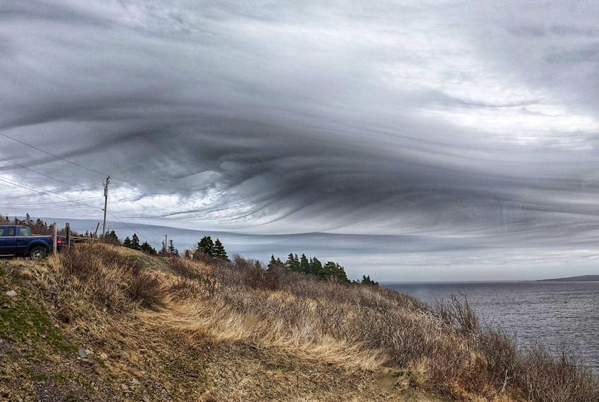 It looks like a painting but it’s a stunning photo taken by Kristi Allan. This rare cloud formation was spotted by many over Petty Harbour-Maddox Cove NL.  The ominous sky created quite a stir and neighbours were calling around to make sure no one missed it!  The photo was taken last Saturday evening as the upper-level winds started to influence cloud development hundreds of kilometres ahead of the incoming storm.